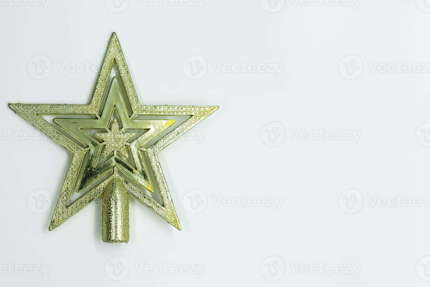 Christmas star decoration on white background. Top view with copy space for text. photo