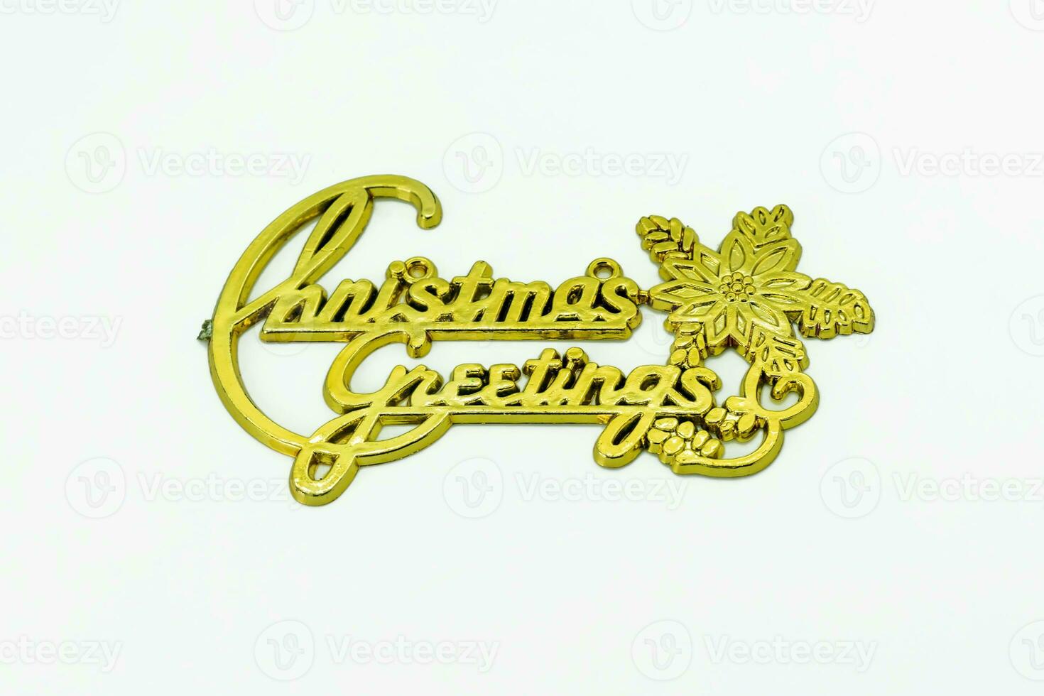 The word merry christmas is written in gold on white background, clipping path photo