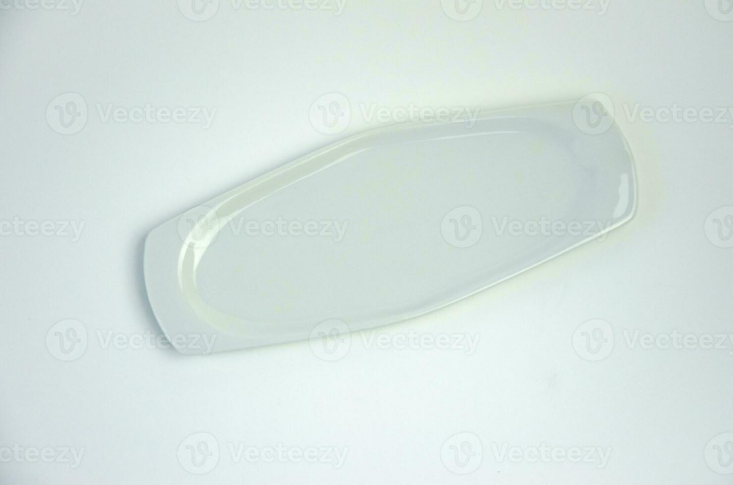 Empty white plate on white background. High quality photo