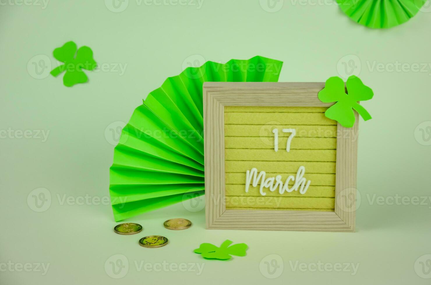 St. Patrick's Day holiday concept, date and clover on background. High quality photo