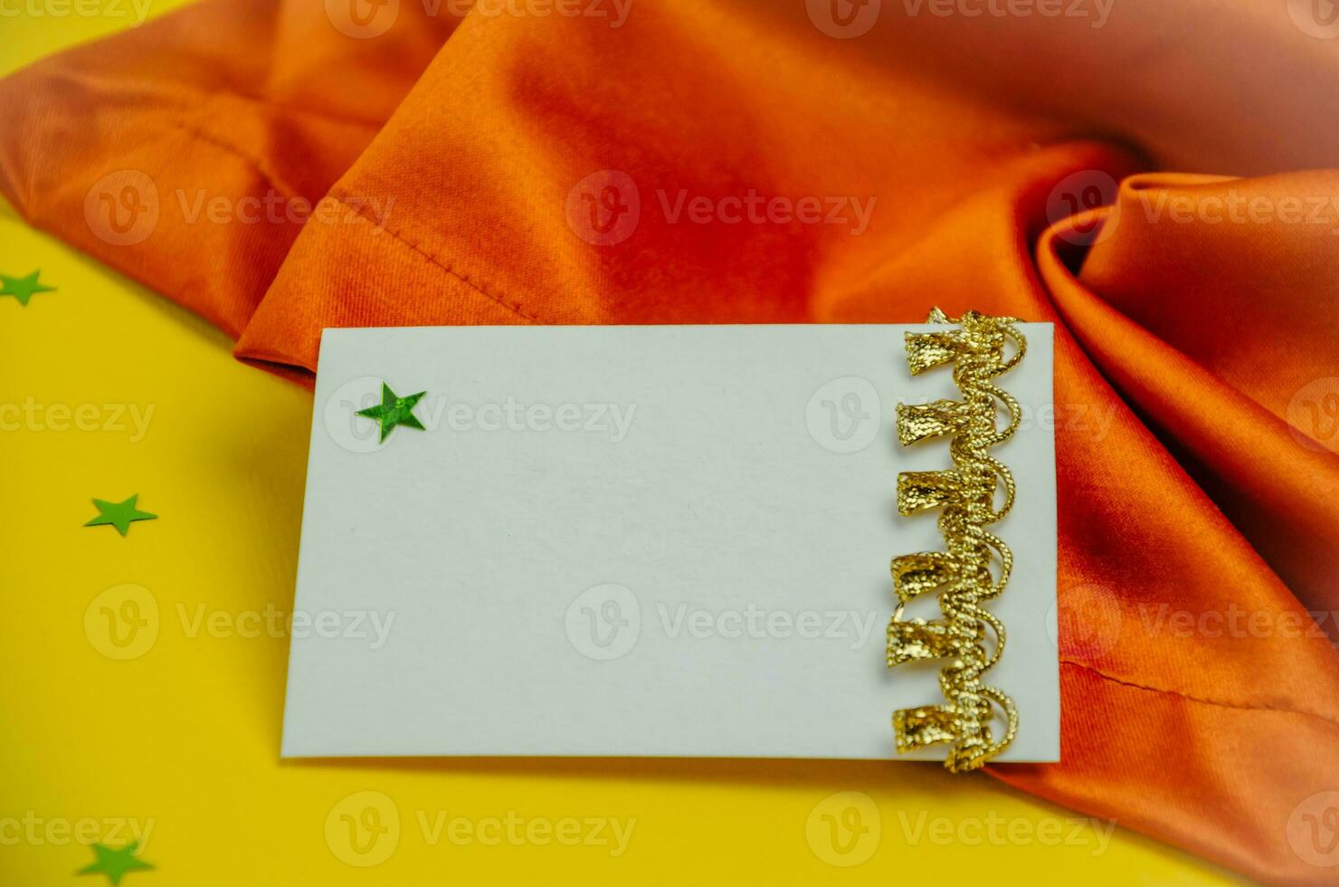 Yellow and brown background with a sheet for writing greetings photo
