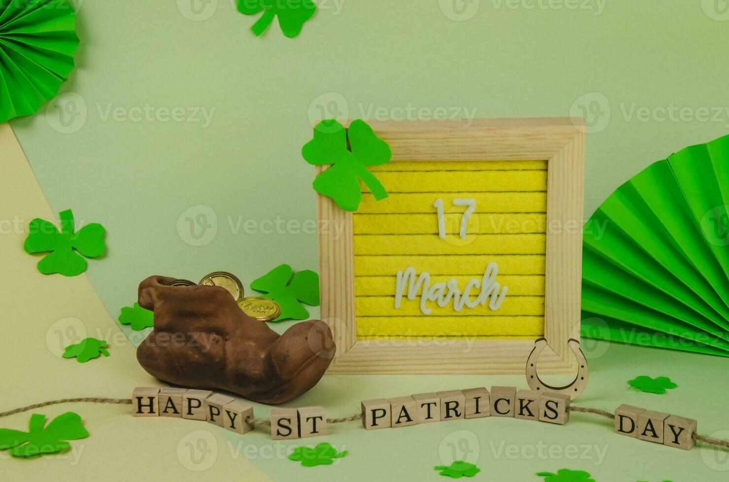 St. Patrick's Day lettering with objects and decorations photo