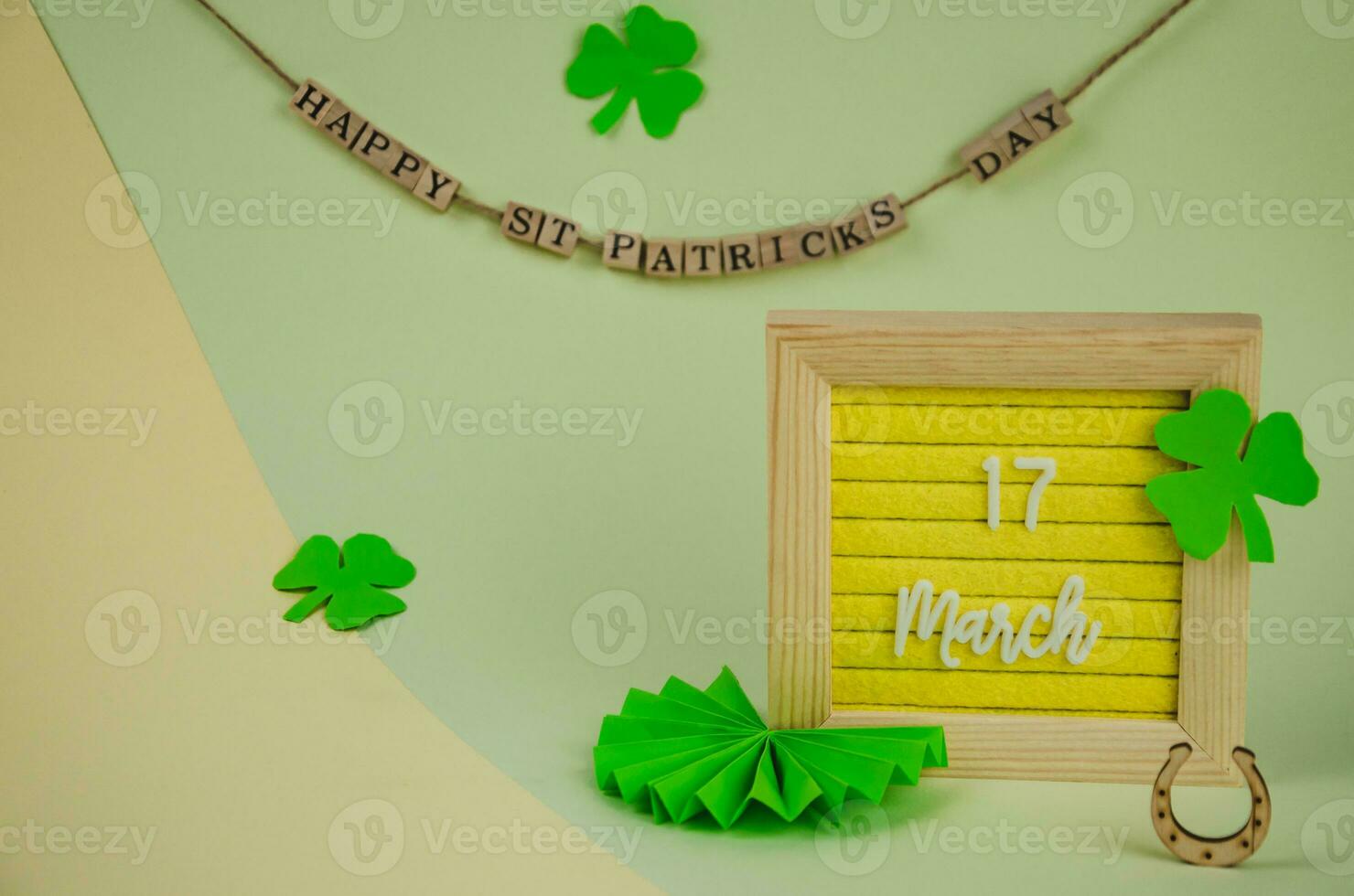 St. Patrick's Day lettering with objects and decorations photo