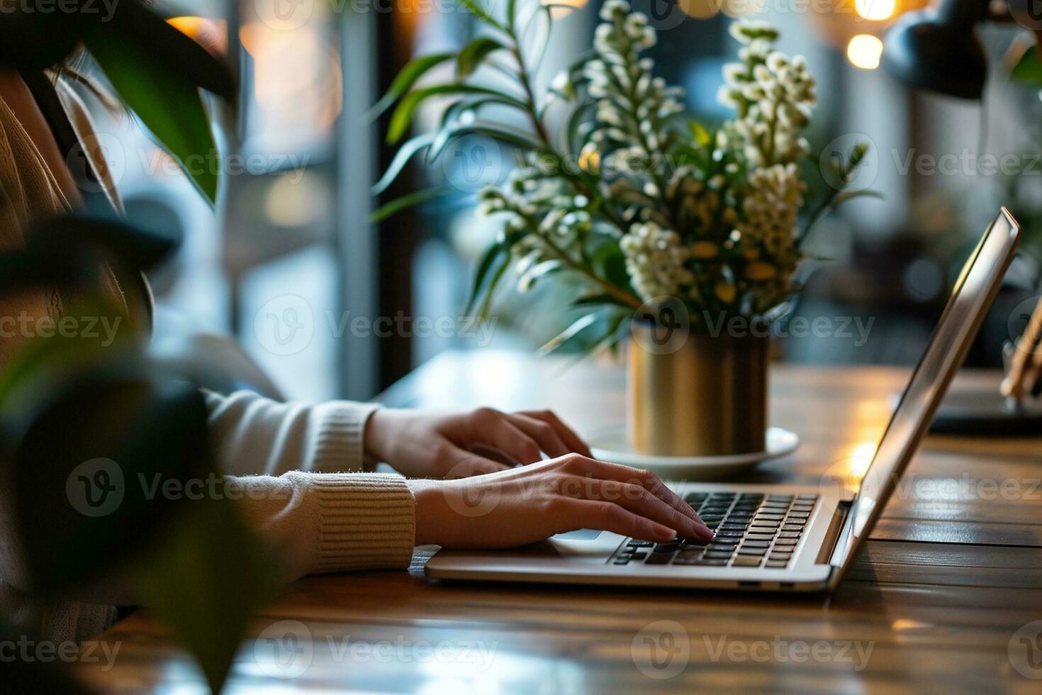 AI generated Close up of female hands typing on laptop keyboard at table in cafe photo