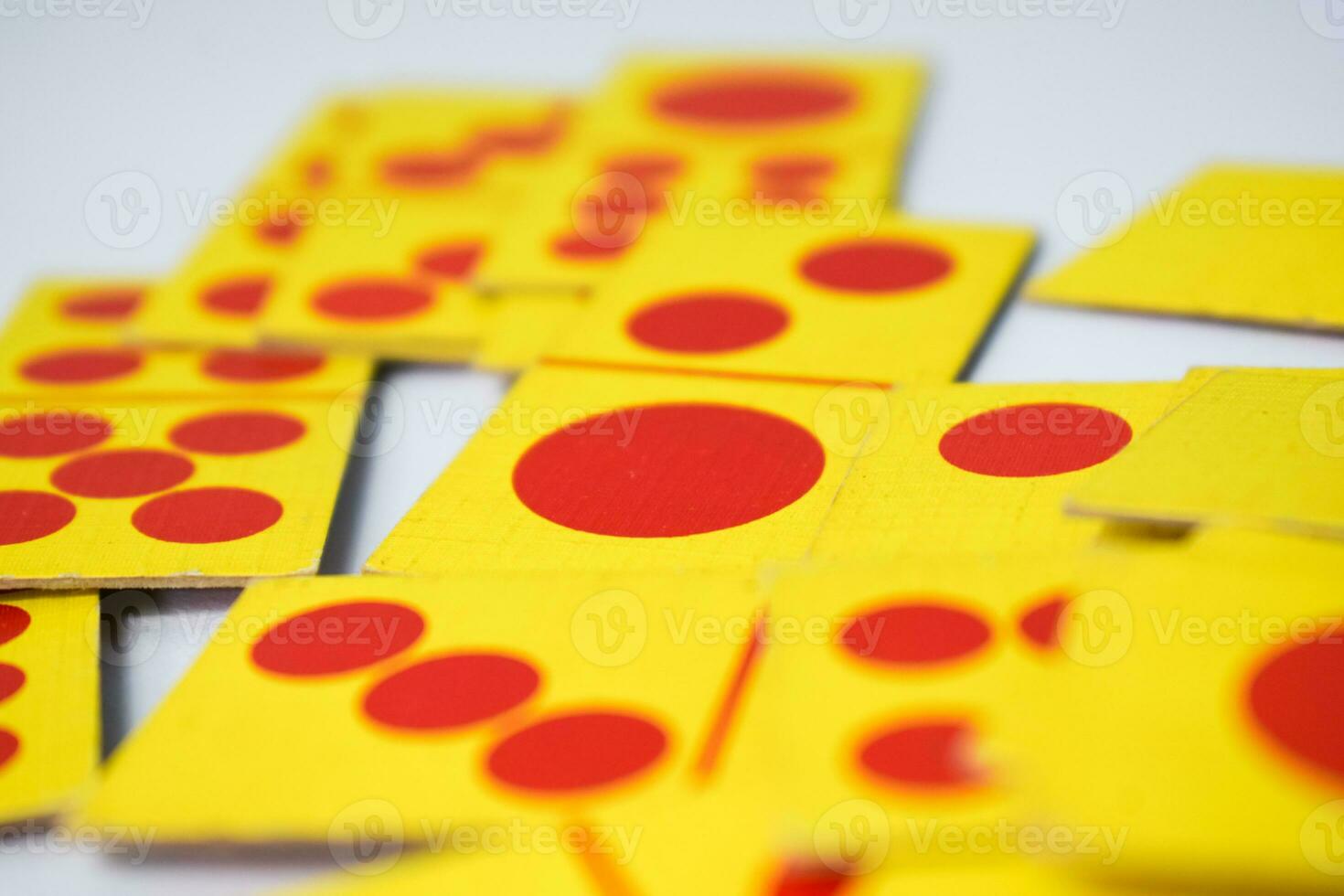 dominoes playing cards isolated white background, yellow red dominoes cards photo