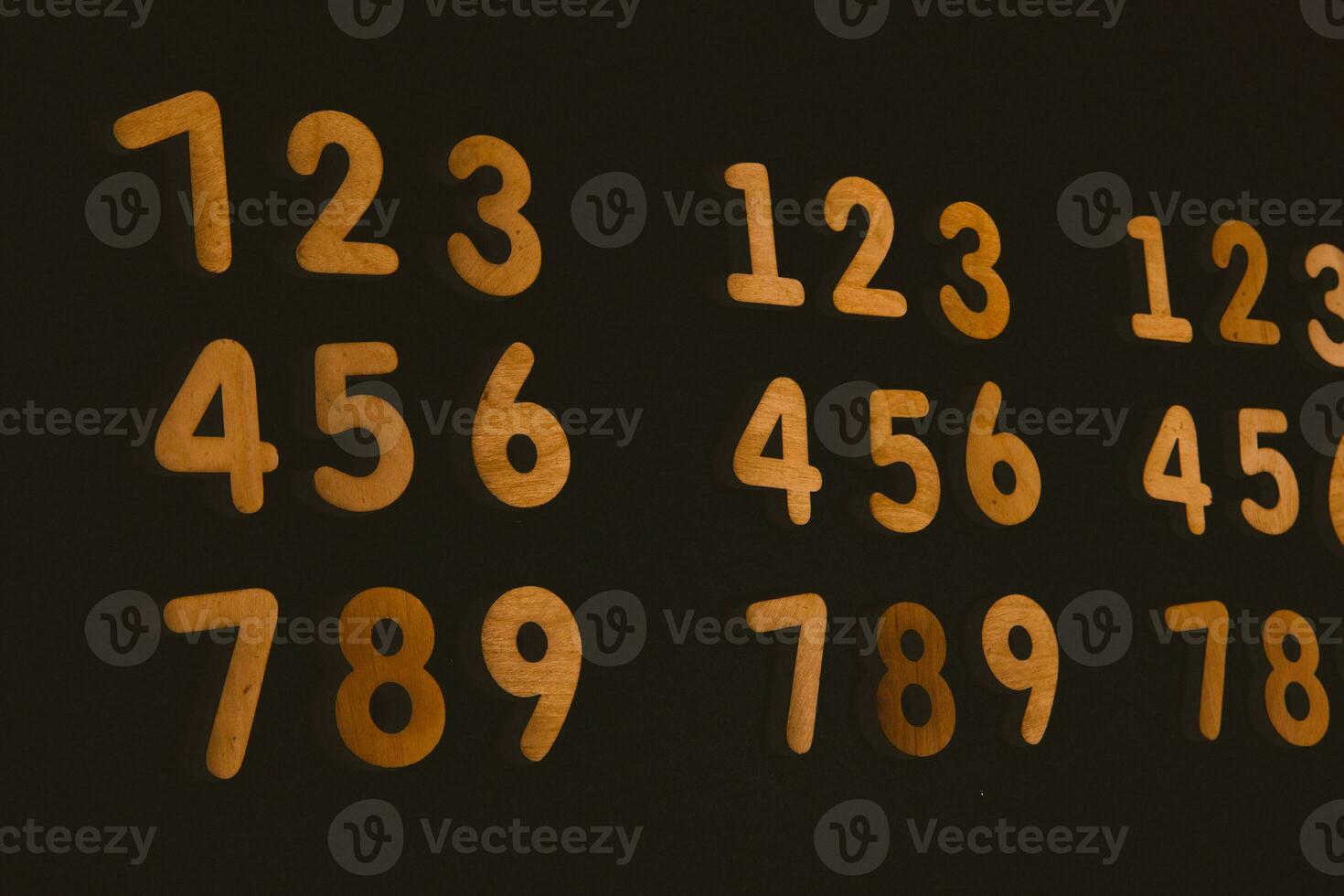 Numbers on a dark background. Seamless pattern. Toned. photo