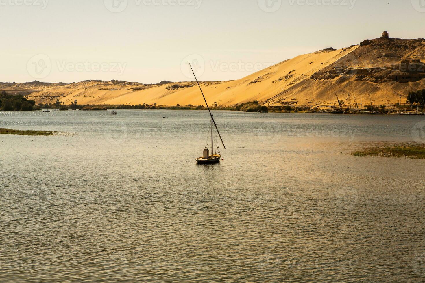 Nile the longest river in Africa. Primary water source of Egypt. Landscape with clear water river. photo