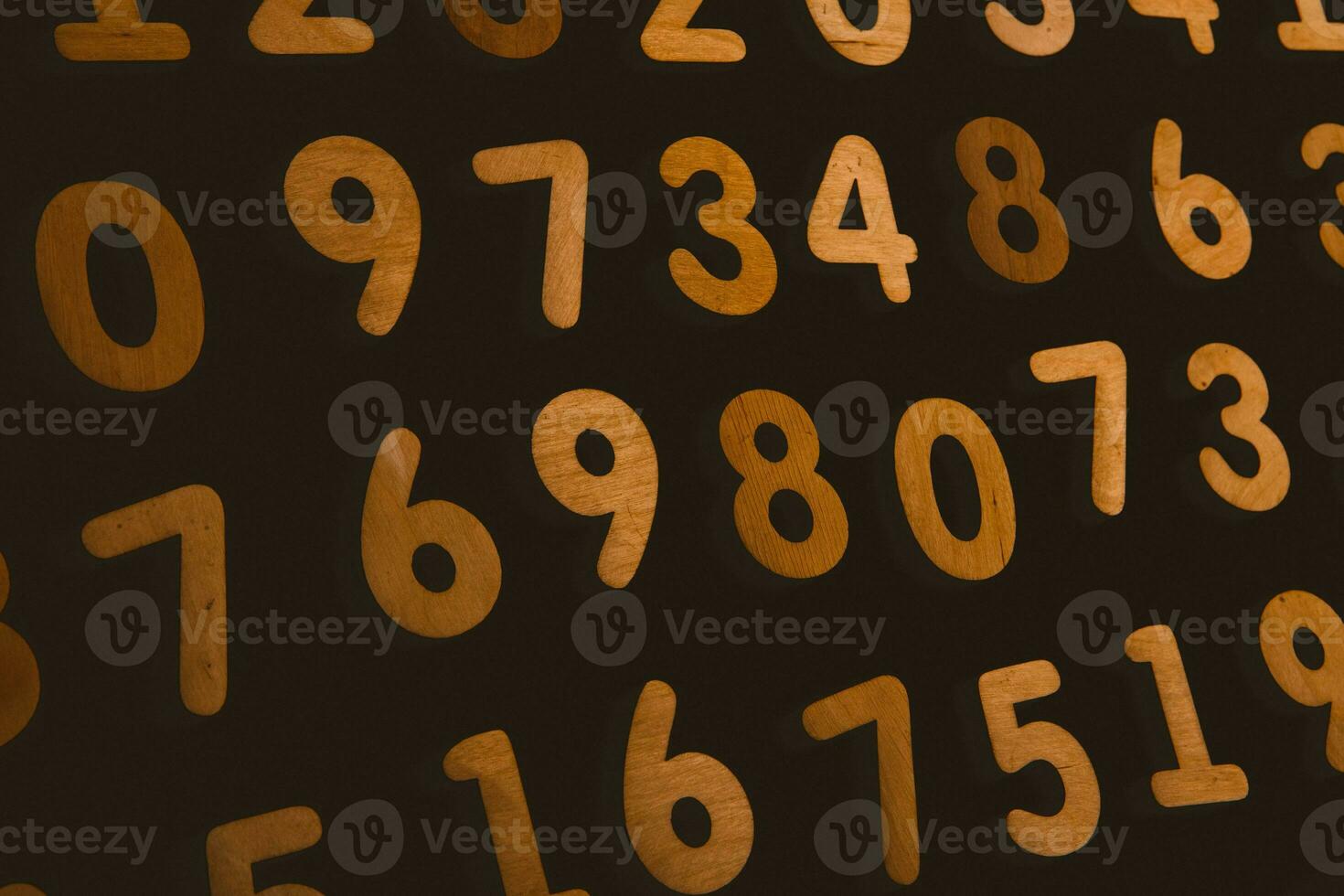 Numbers on a dark background. Seamless pattern. Toned. photo