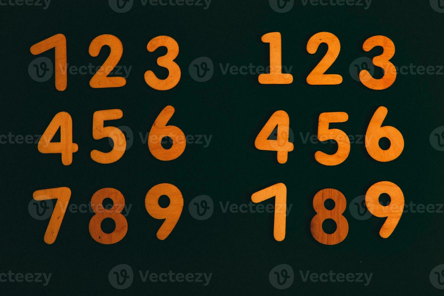 Colorful wooden numbers on black background. Number 1 to 9. photo