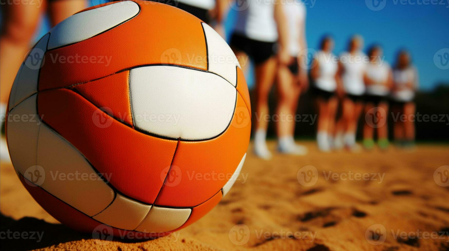 AI generated A volleyball ball on sandy beach with a group of people standing behind it, ready to play. photo