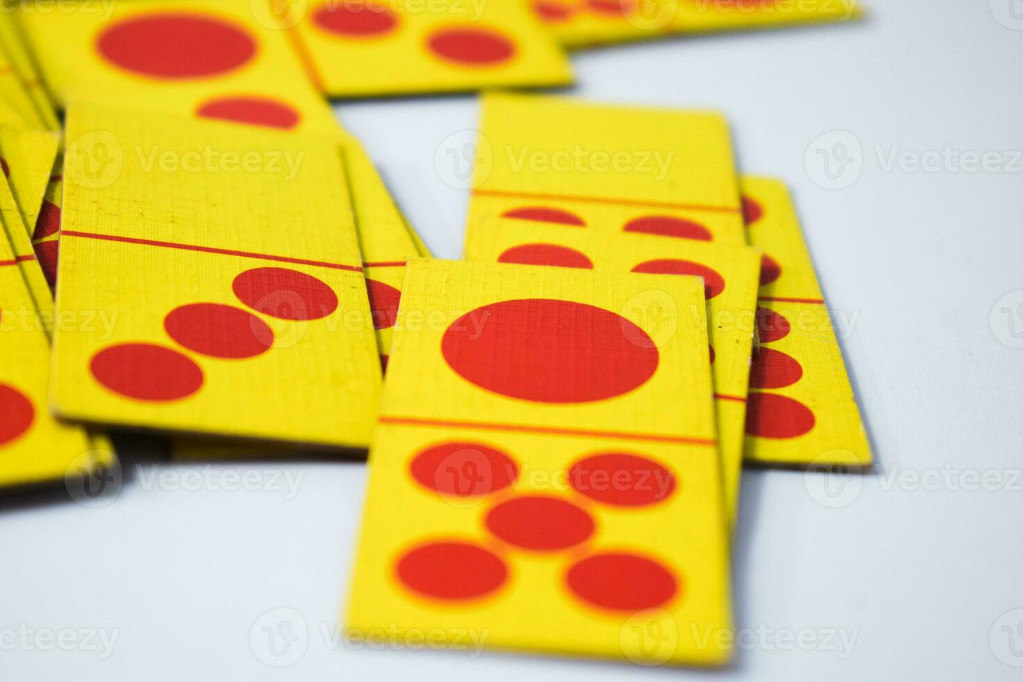 dominoes playing cards isolated white background, yellow red dominoes cards photo