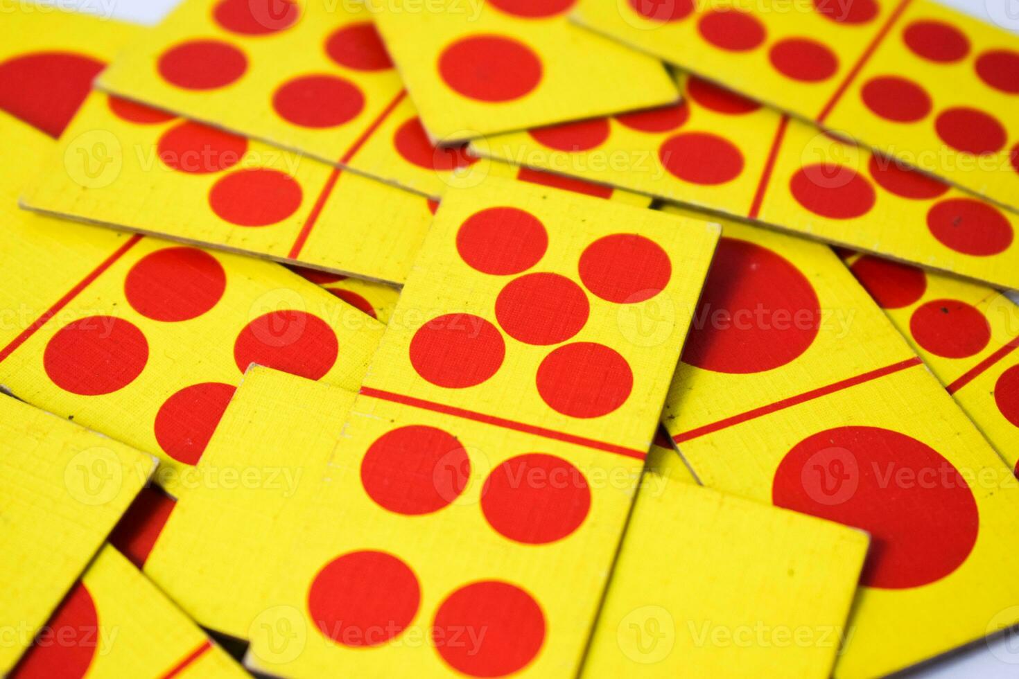 dominoes playing cards isolated white background, yellow red dominoes cards photo