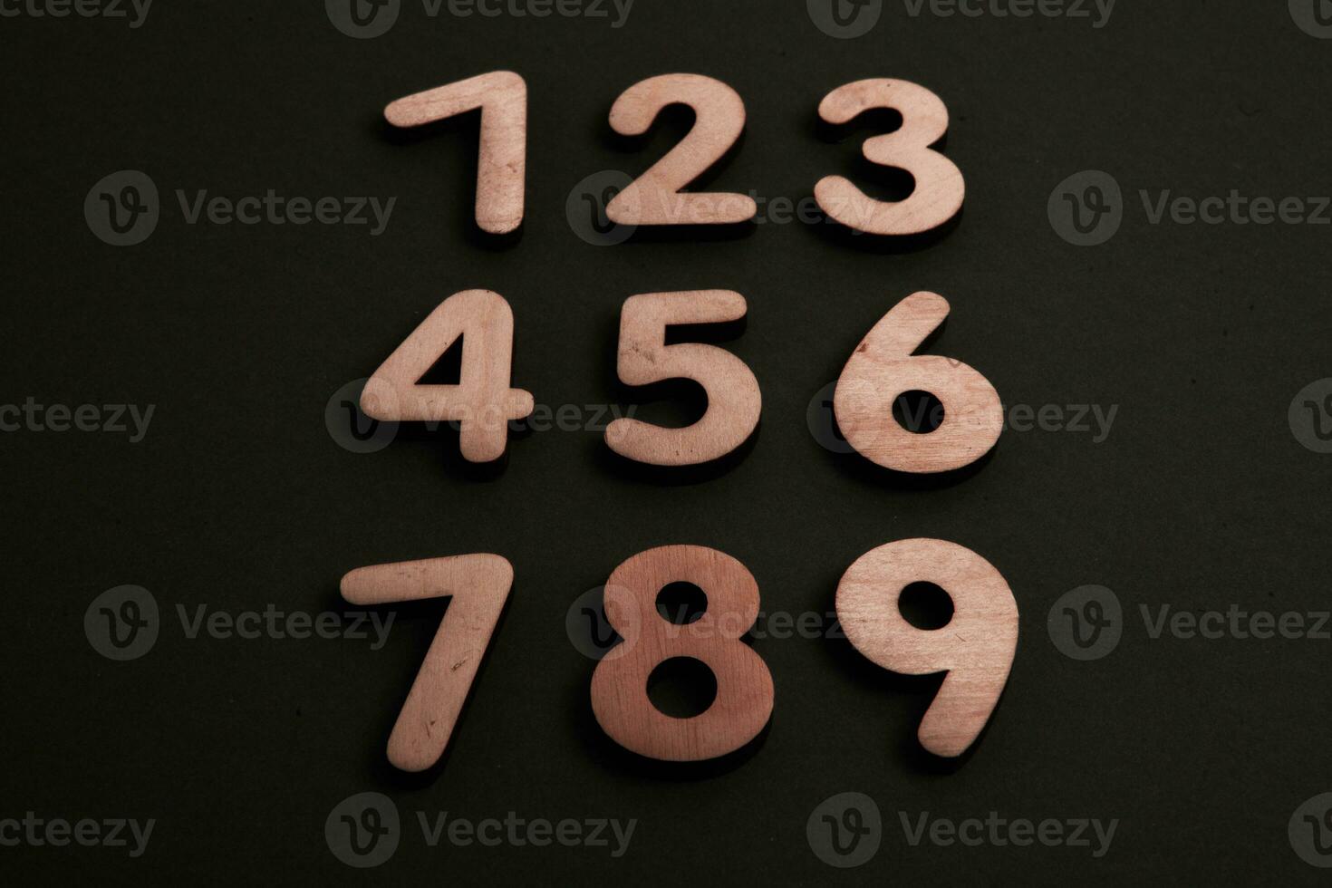 Numbers on a dark background. Seamless pattern. Toned. photo