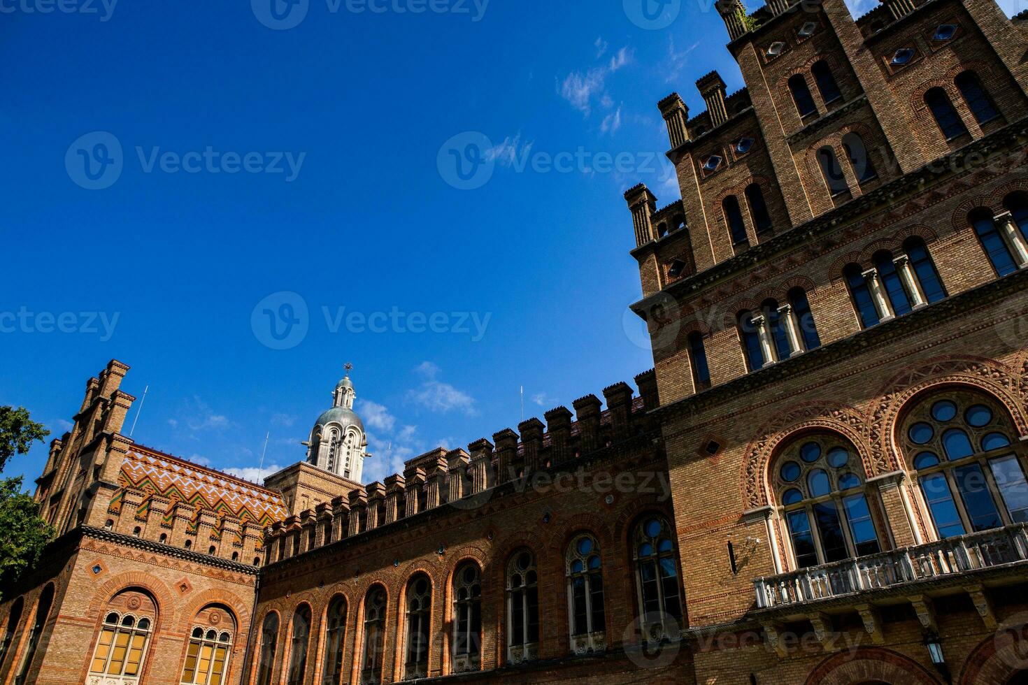 Architecture and streets of the old town. The historic architecture of Chernivtsi, Ukraine. Old city after the rain. photo