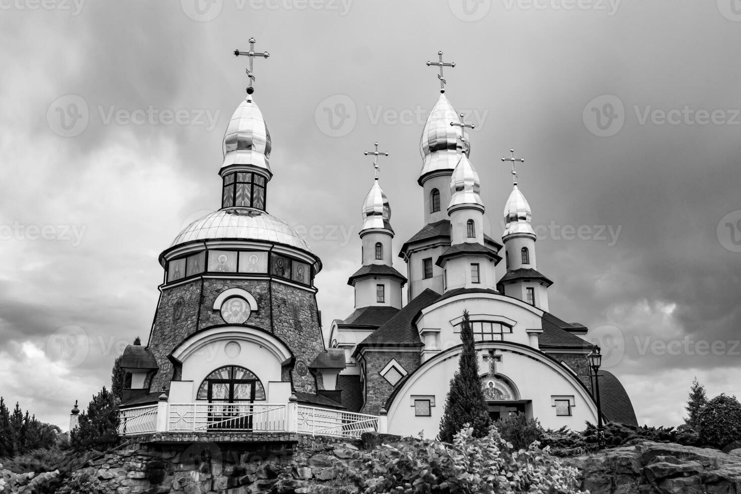 Christian church cross in high steeple tower for prayer photo