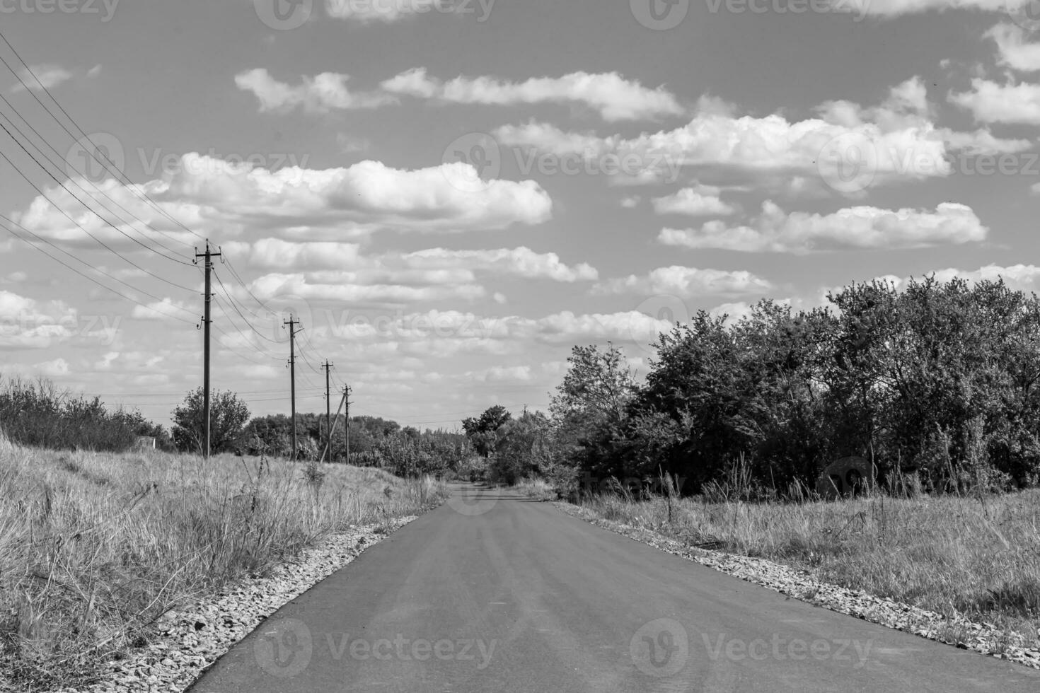 Beautiful empty asphalt road in countryside on light background photo