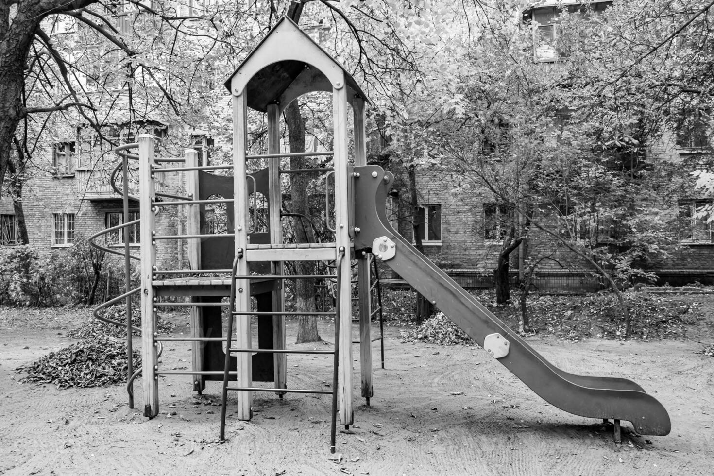 Photography on theme empty playground with metal slide for kids photo