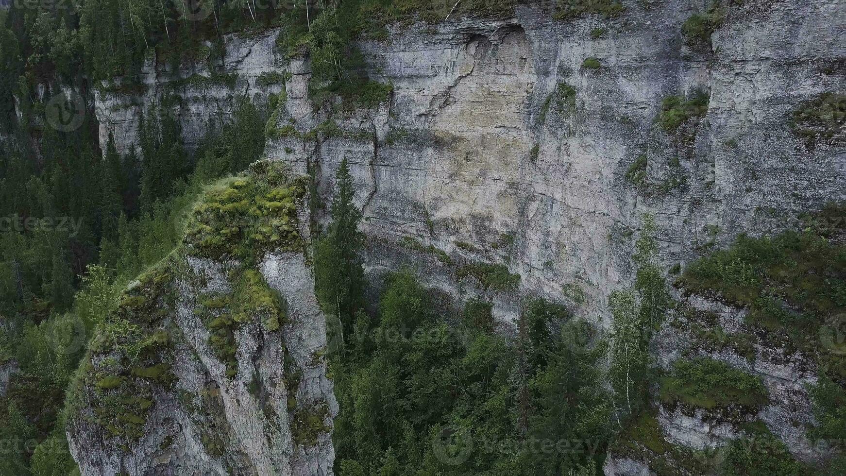 Beautiful mountain lookout high on the Mountains. Clip. Huge valley with thick eucalyptus forest. Top view of a large cliff in the forest photo