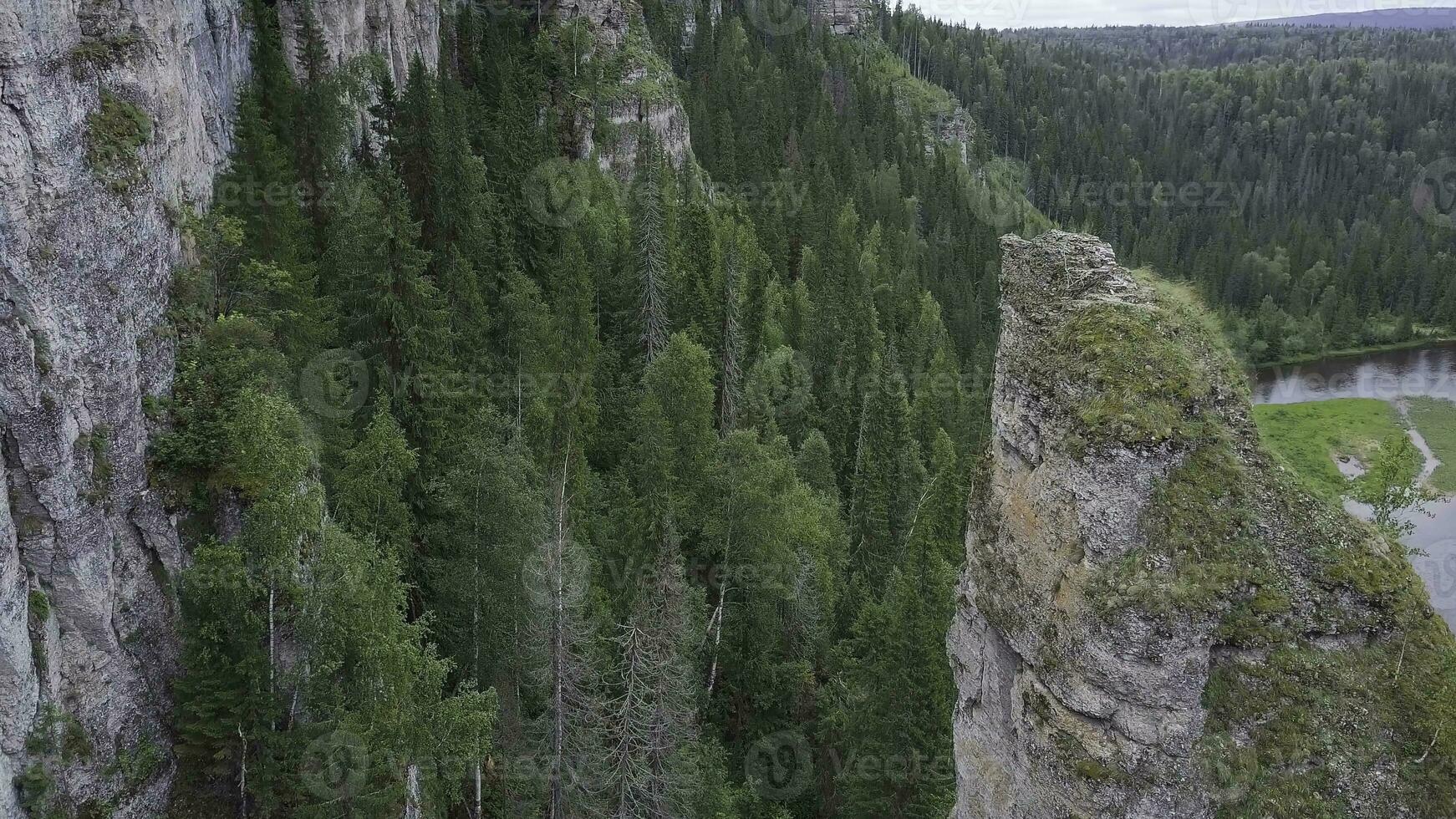 Beautiful mountain lookout high on the Mountains. Clip. Huge valley with thick eucalyptus forest. Top view of a large cliff in the forest photo