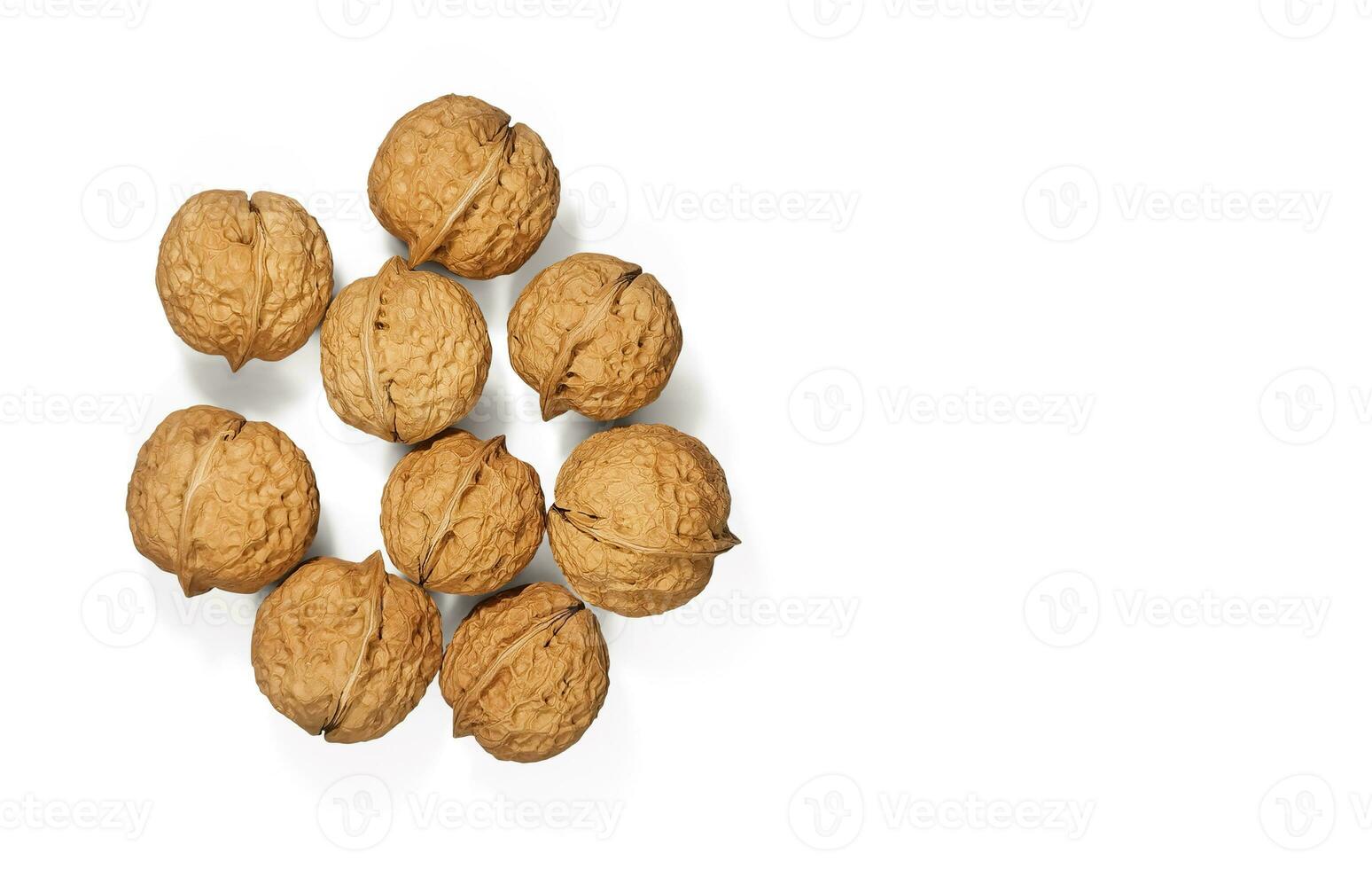 Walnuts isolated on white background. Top view. photo