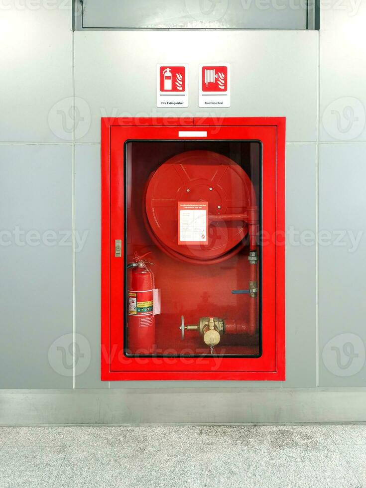 Fire hose cabinet in an office building to prepare for fire protection. photo