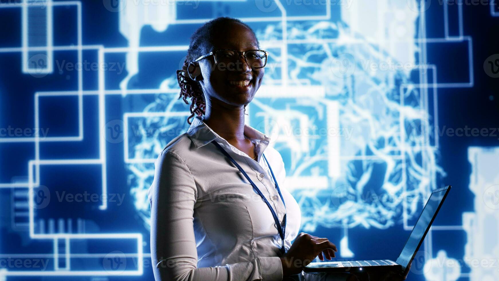 Portrait of happy engineer updating AI systems, writing intricate binary code scripts on laptop. Computer scientist using programming to upgrade artificial intelligence simulation model photo