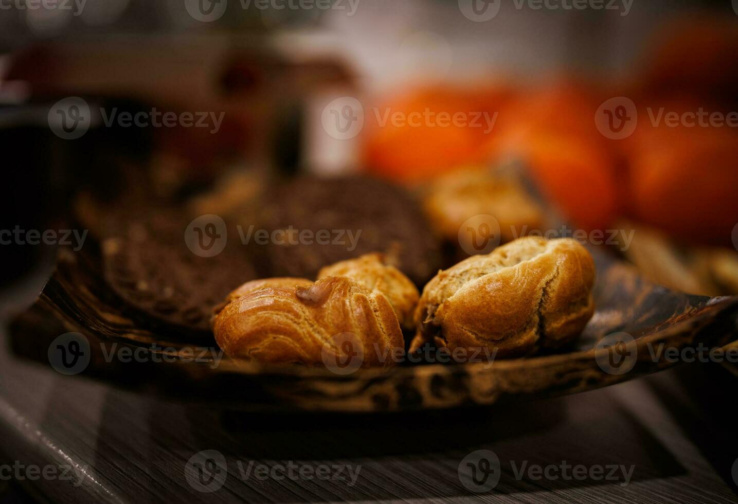 Chewy cookies on a wooden plate. photo