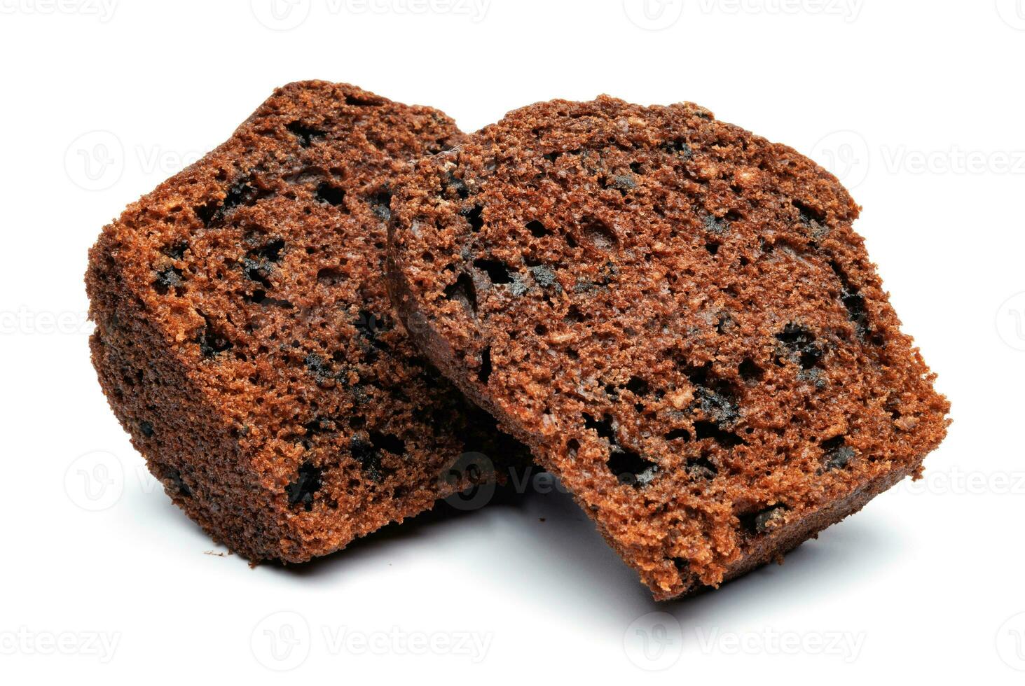 Chocolate muffin cut in half isolated on a white background. Chocolate chip muffin. photo