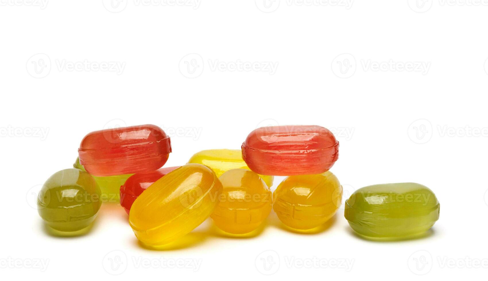 colorful fruit hard candy isolated on white. lollipop, candy, sweetmeat photo