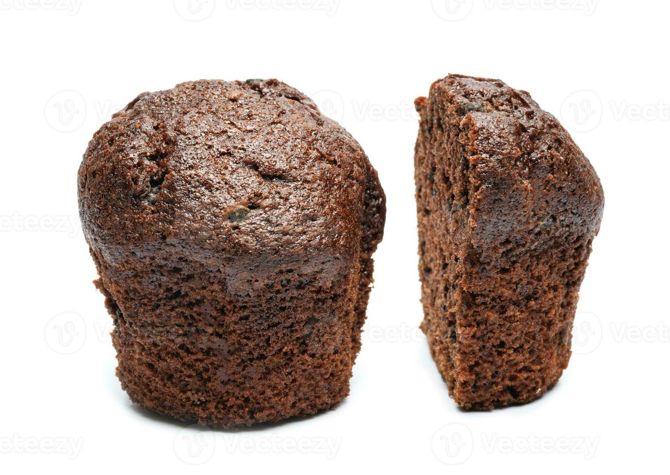 Chocolate muffin cut in half isolated on a white background. Chocolate chip muffin. photo