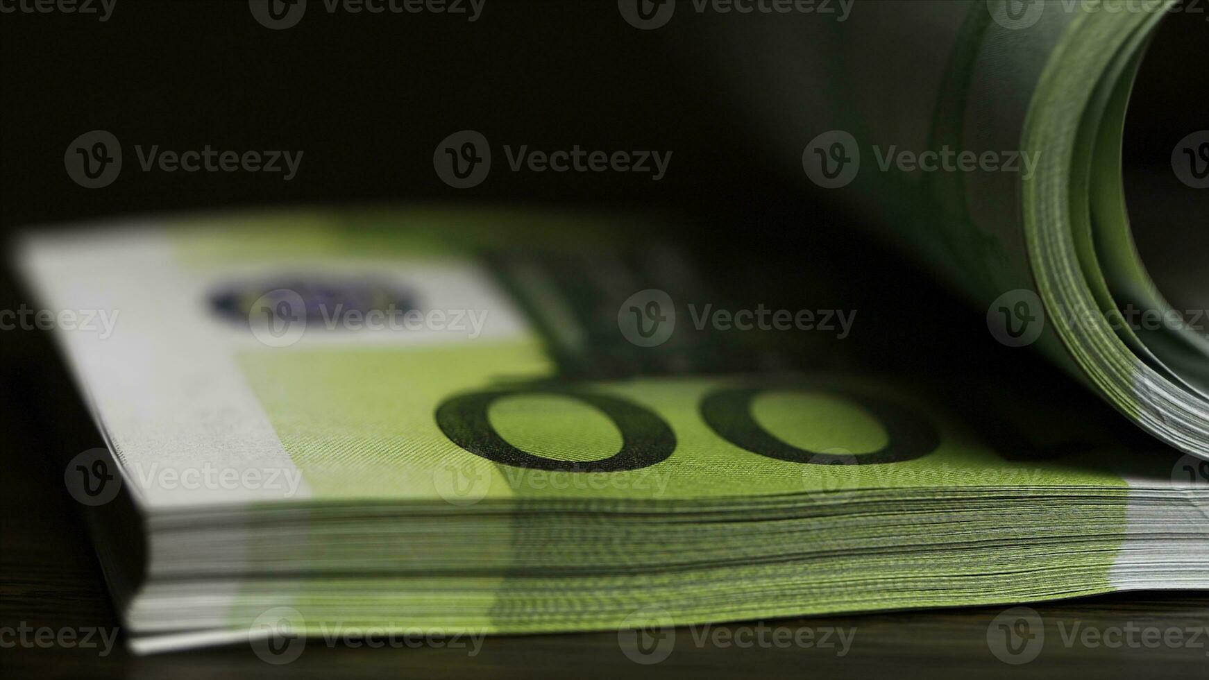 Counting paper money one hundred euro. One hundred Euro, macro. Flipping one hundred Euro banknotes on the table photo