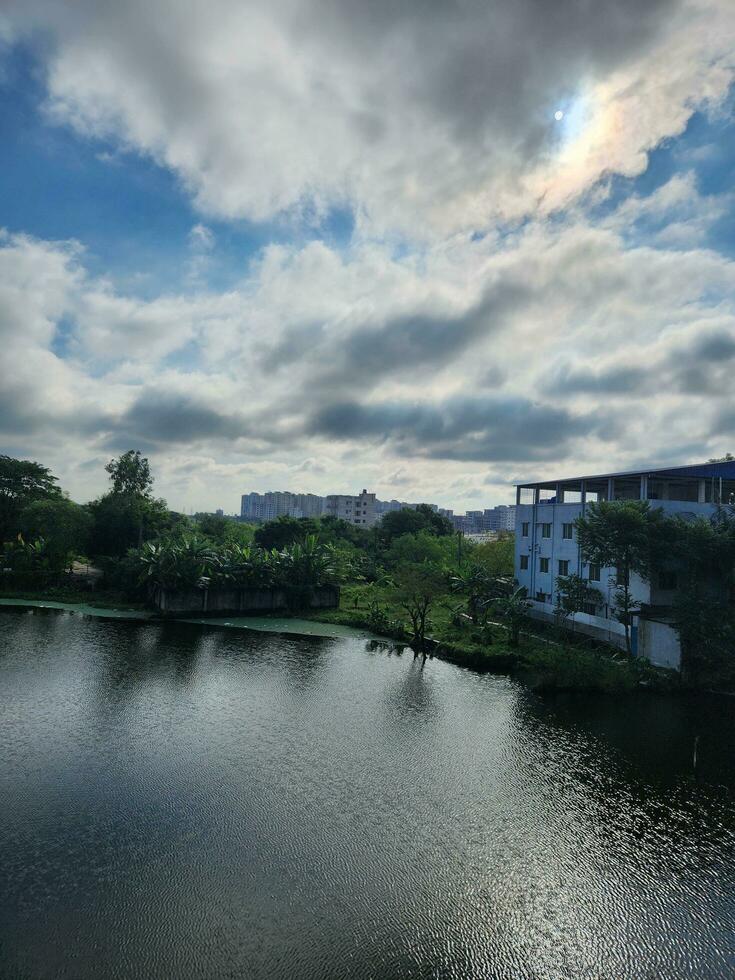 Rural surroundings with water and trees photo