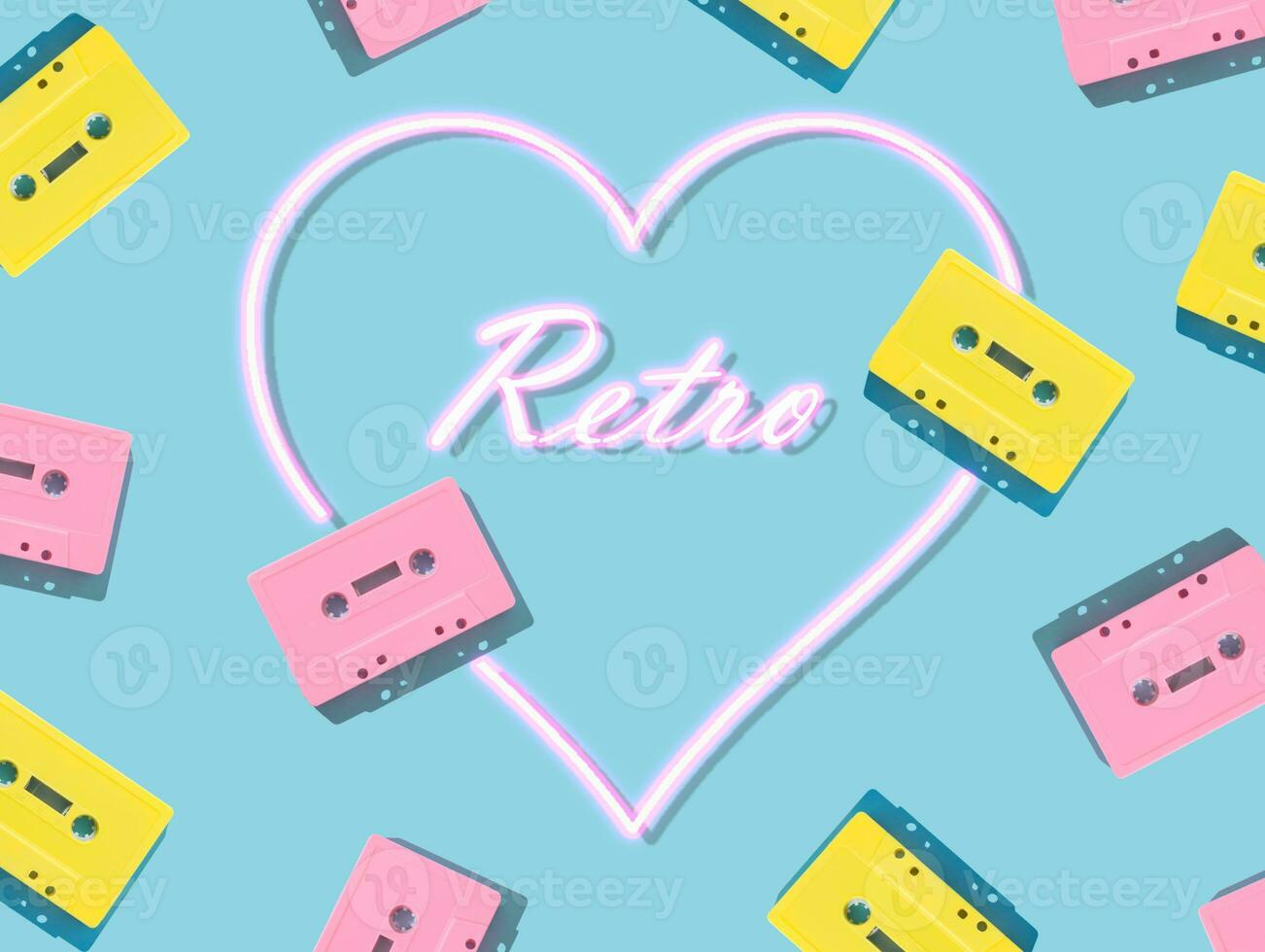 Pattern of retro pink and yellow audio cassette tapes with pink neon heart on blue background. Creative concept of retro technology. 80's aesthetic. Vintage audio cassette tape idea. Retro nostalgia. photo