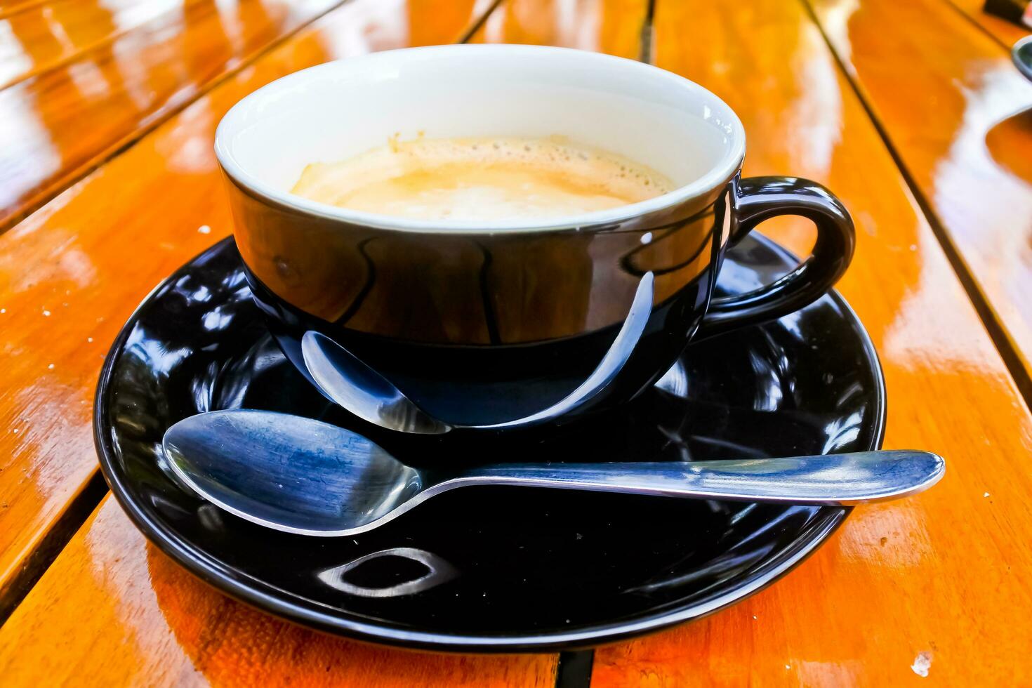 close up view of a cup of cappuccino coffee photo