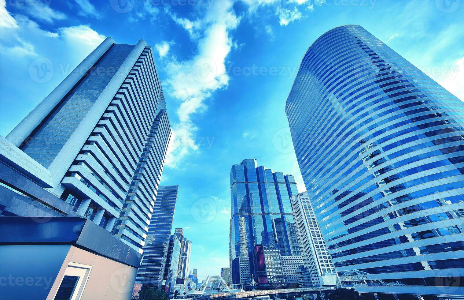 Wide view of business district skyscrapers with modern office buildings in the capital city of Bangkok, Thailand. photo