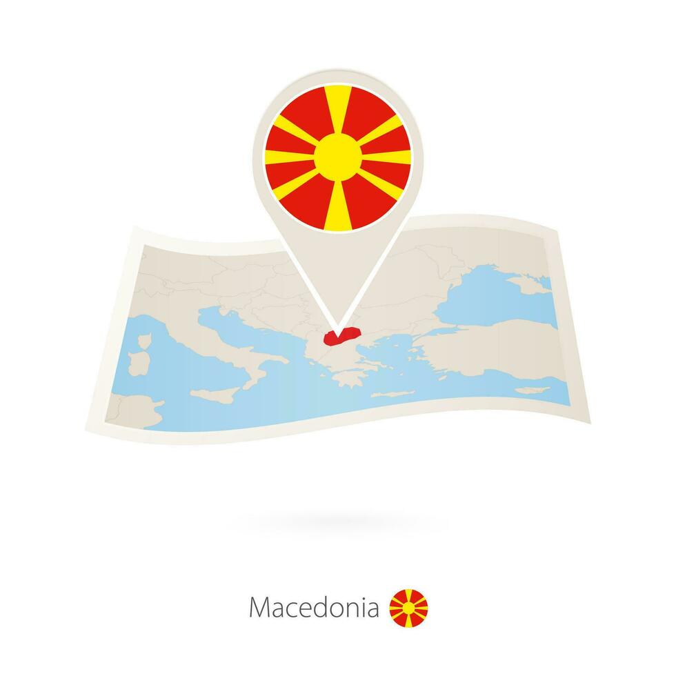 doblada papel mapa de macedonia con bandera alfiler de macedonia. vector