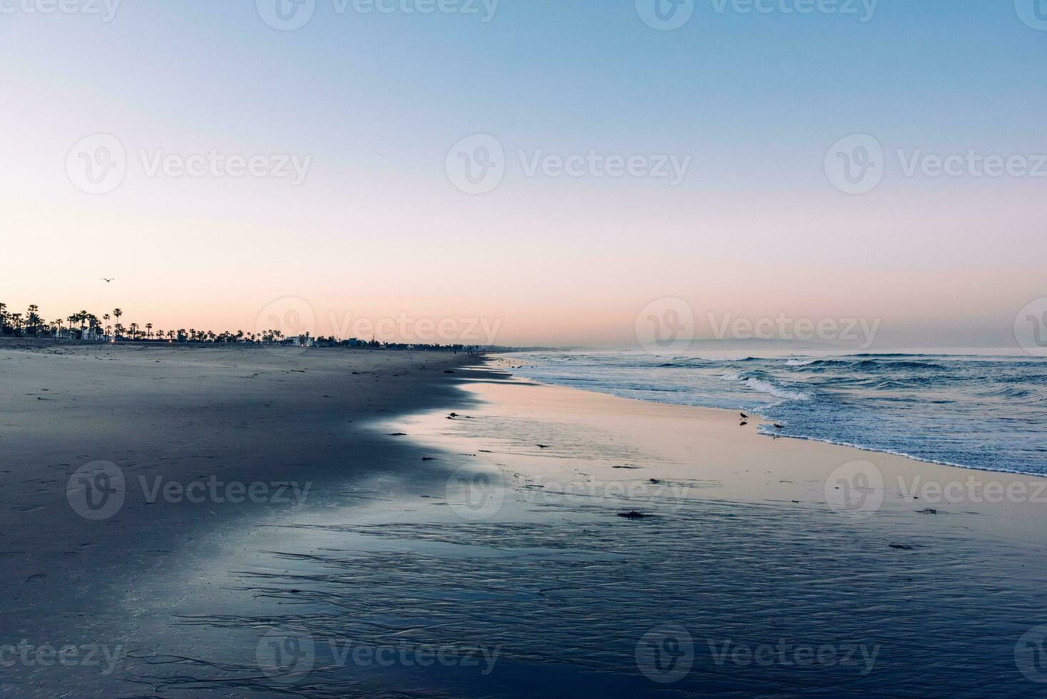 Sunrise on Santa Monica beach photo