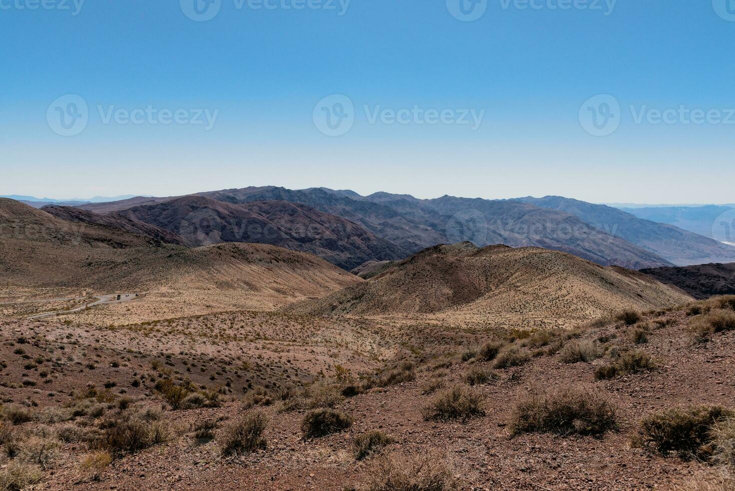 Desert mountains of Nevada with blue sky on the background photo