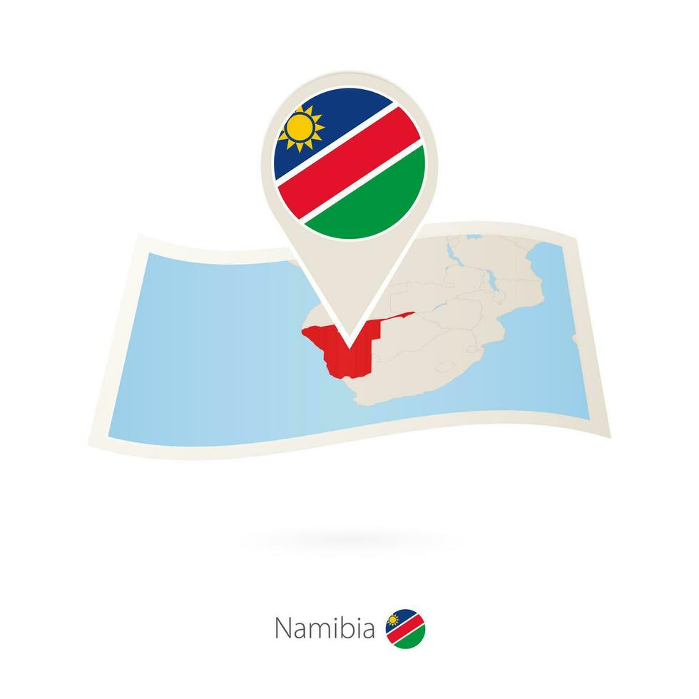 doblada papel mapa de Namibia con bandera alfiler de Namibia. vector