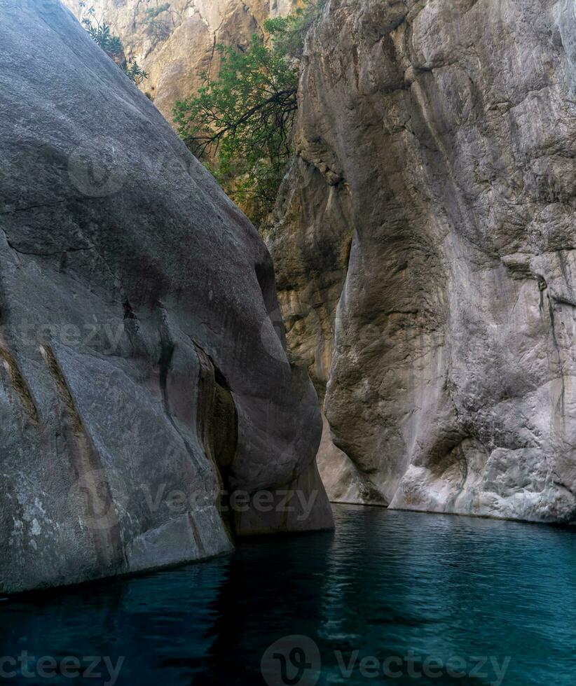 rocky canyon with blue water in Goynuk, Turkey photo