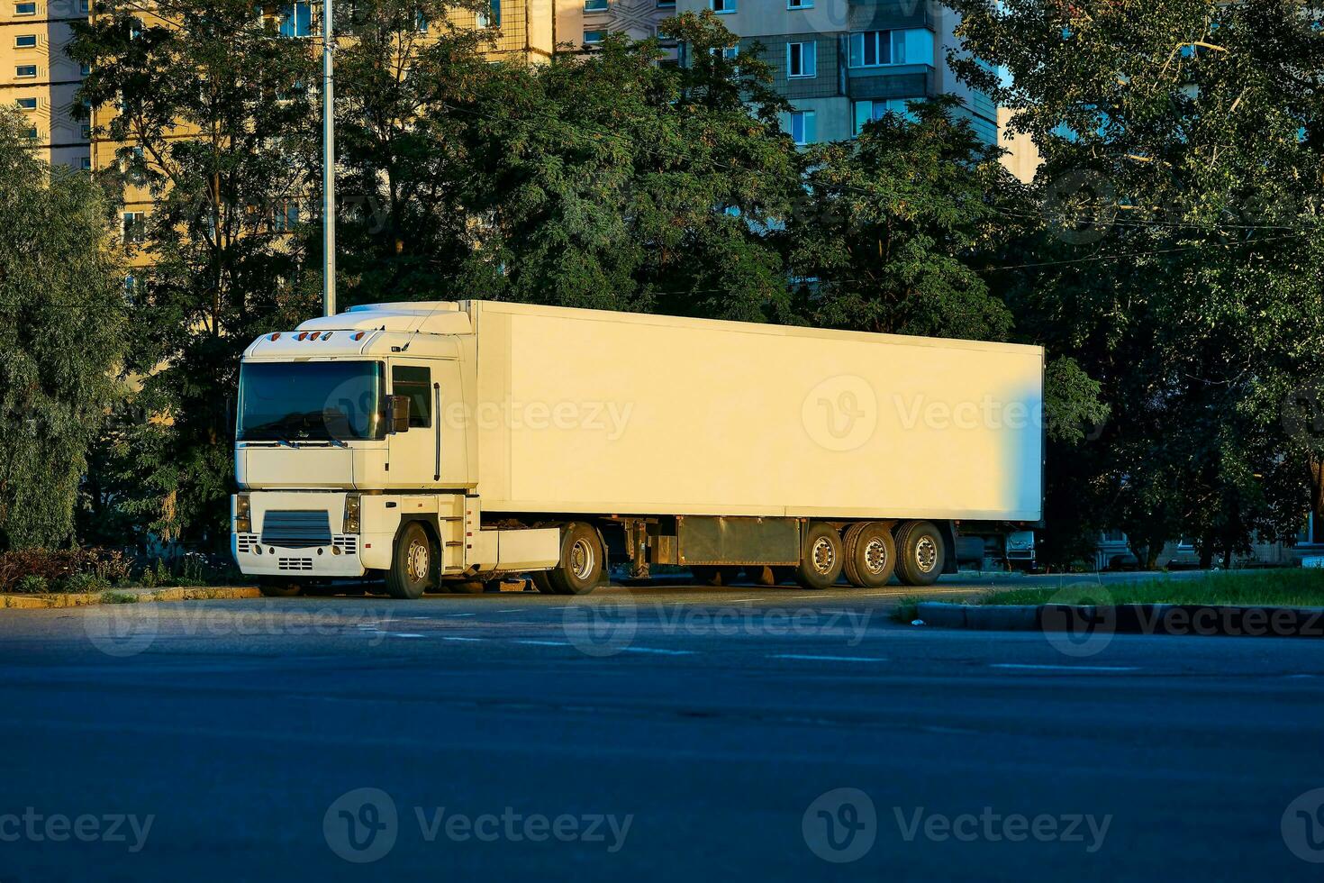 Long distance truck for transporting goods in the parking lot photo