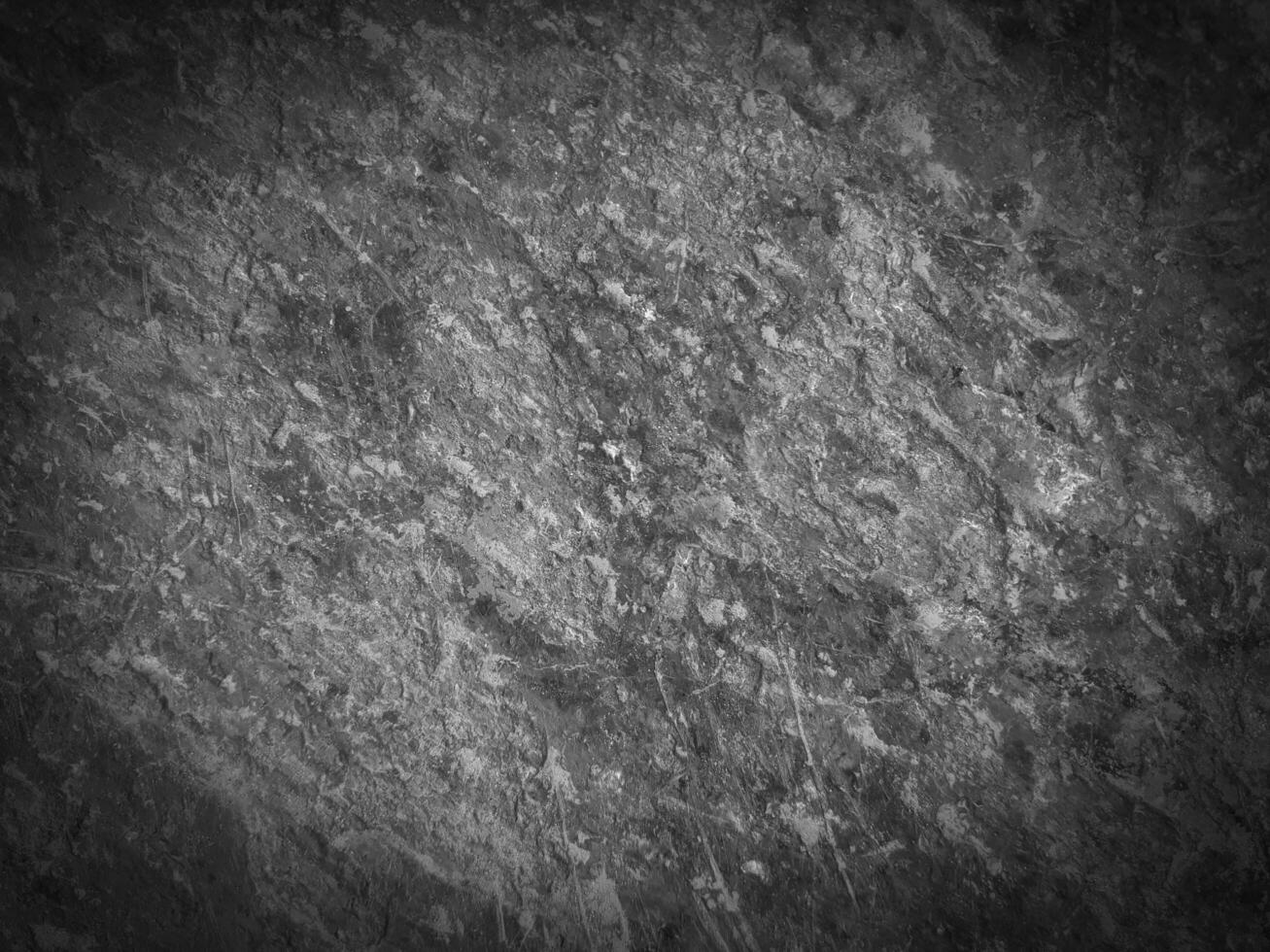 Black stone background. Long black stone texture and textured. Dirty black stone wall. Rock texture with cracks. stone tile floor texture. Old wall texture abstract natural background. photo