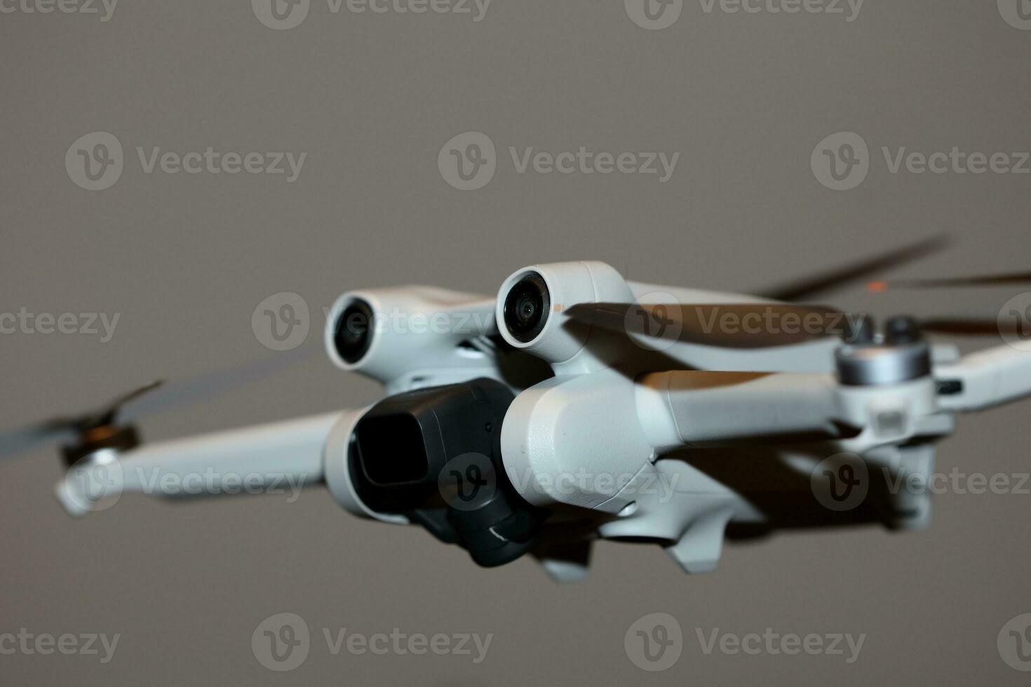 Macro view drone sensor and drone propeller focus is on second propeller droning concept video film making operator rent equipment backgrounds high quality footages photo