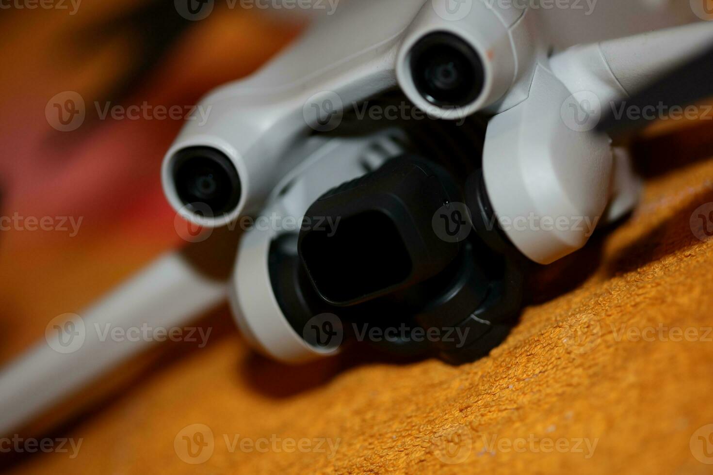 Macro view drone sensor and drone propeller focus is on second propeller droning concept video film making operator rent equipment backgrounds high quality footage photo