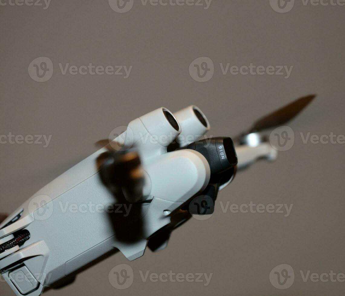 Macro view drone sensor and drone propeller focus is on second propeller droning concept video film making operator rent equipment backgrounds high quality footages photo