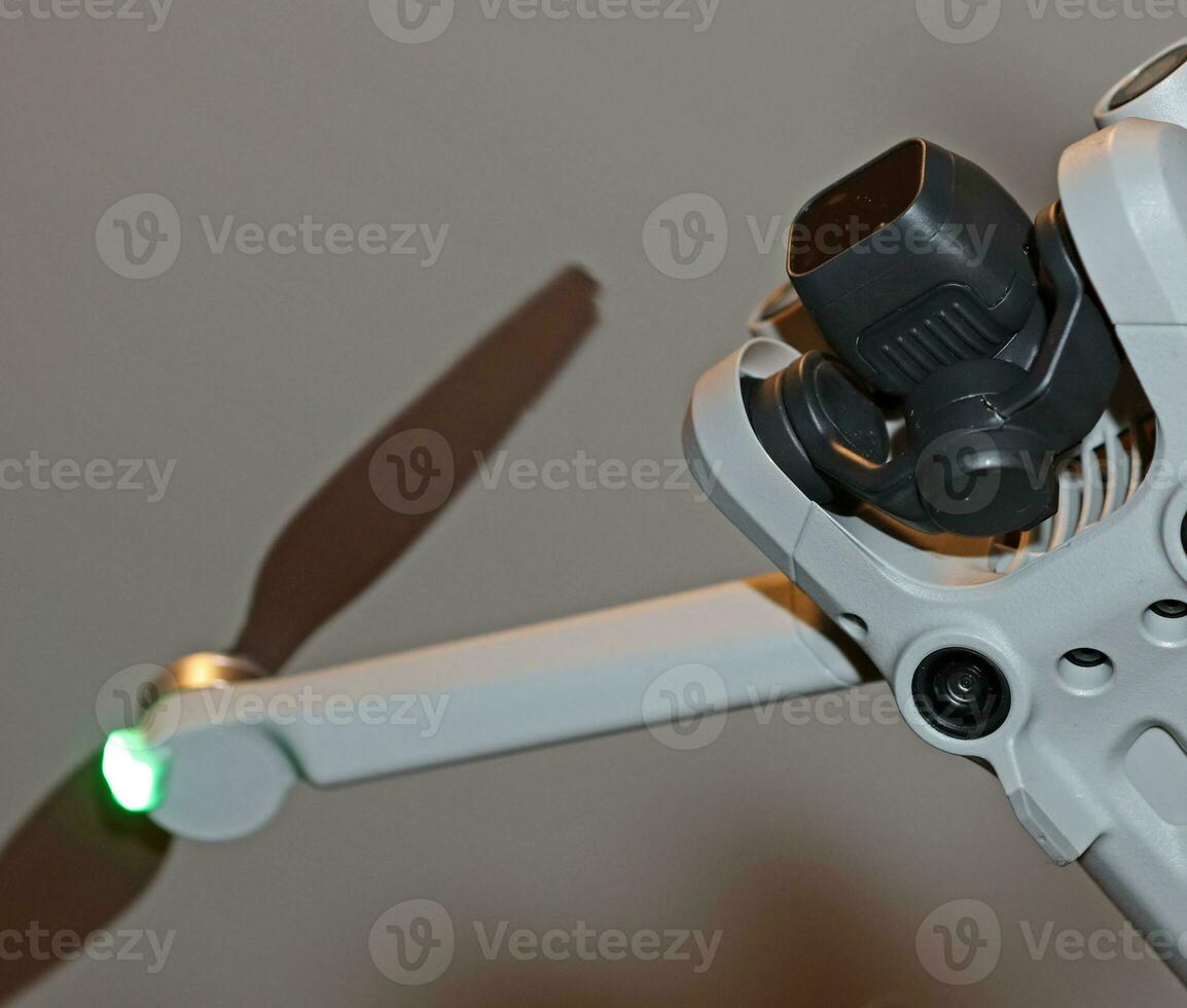 Macro view drone sensor and drone propeller focus is on second propeller droning concept video film making operator rent equipment backgrounds high quality footages photo