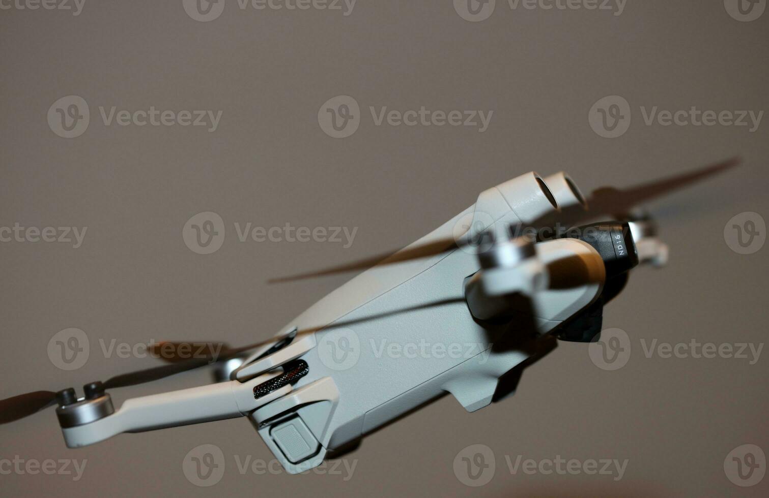 Macro view drone sensor and drone propeller focus is on second propeller droning concept video film making operator rent equipment backgrounds high quality footages photo