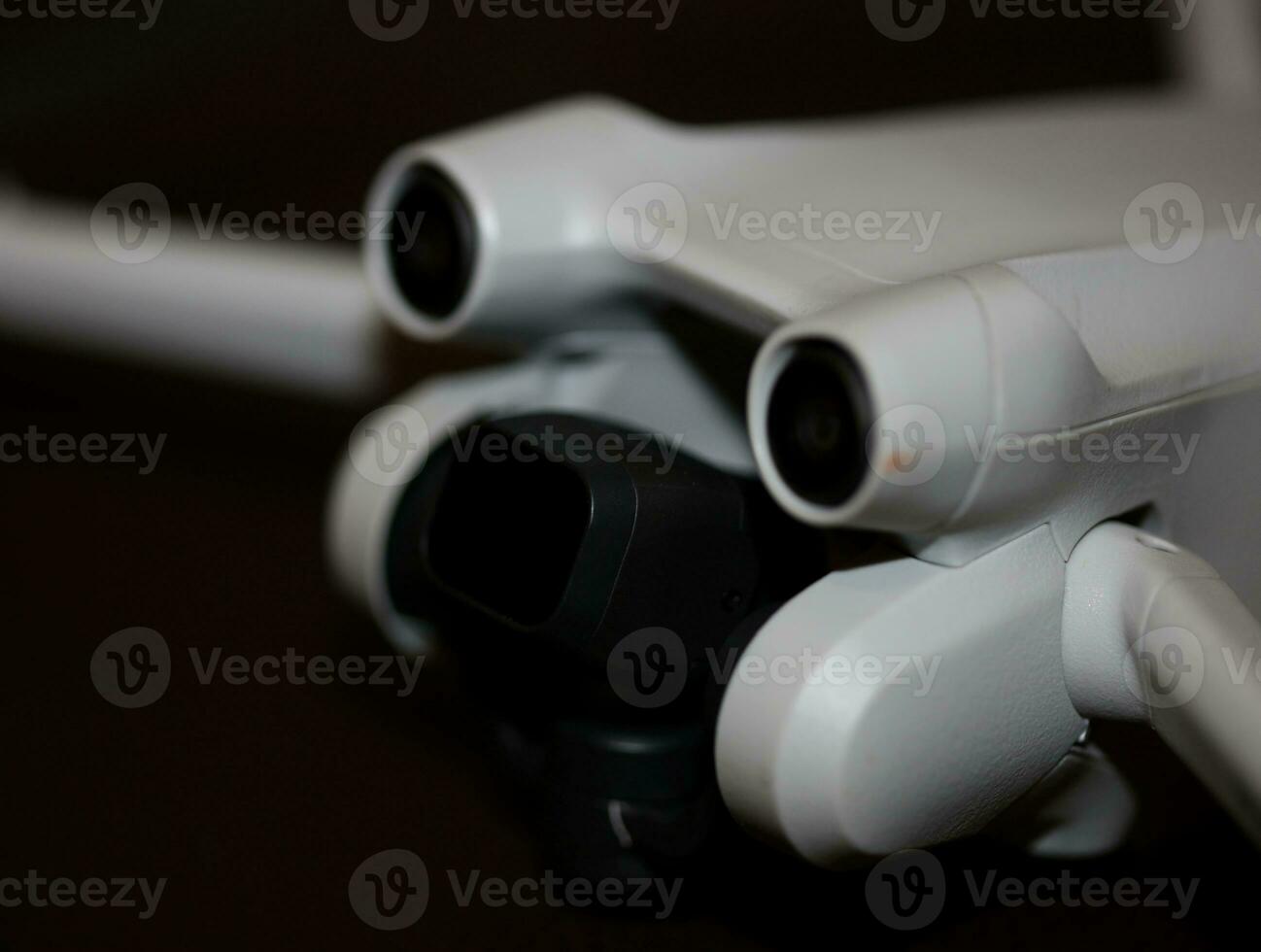 Macro view drone sensor and drone propeller focus is on second propeller droning concept video film making operator rent equipment backgrounds high quality footages photo