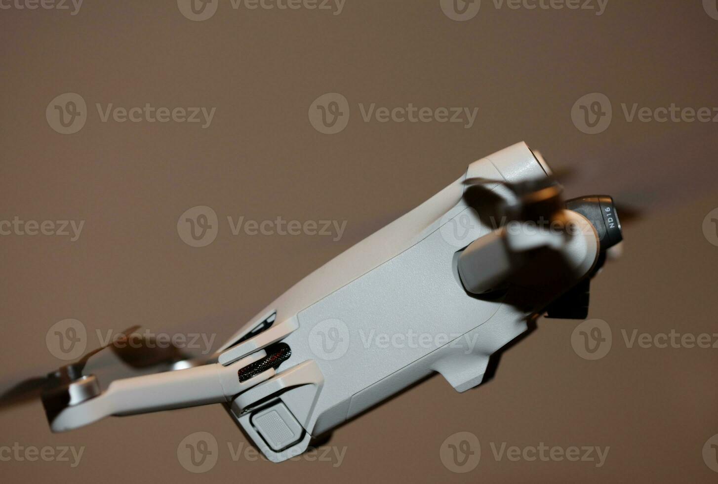 Macro view drone sensor and drone propeller focus is on second propeller droning concept video film making operator rent equipment backgrounds high quality footages photo