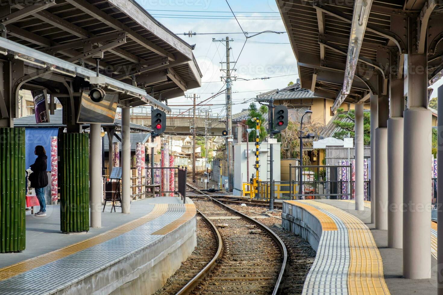 Traffic sign on track in platform station photo